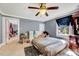 Spacious bedroom featuring a ceiling fan, a rug, bed and a window at 290 Collie Rd, Castalia, NC 27816