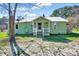 The exterior features a cozy covered porch and a freshly painted exterior at 290 Collie Rd, Castalia, NC 27816