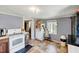 This well-lit kitchen features neutral paint, linoleum flooring, and appliances at 290 Collie Rd, Castalia, NC 27816