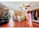 The spacious living room has hardwood floors, neutral paint and lots of natural light at 290 Collie Rd, Castalia, NC 27816