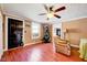 The spacious living room has hardwood floors, neutral paint and lots of natural light at 290 Collie Rd, Castalia, NC 27816