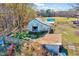 Rustic outbuildings on a property with a large yard, offering potential for storage and hobbies at 290 Collie Rd, Castalia, NC 27816