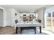 Open concept dining area open to kitchen with hardwood floors and natural light at 2902 Cullens Dr, Graham, NC 27253