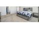 Spacious main bedroom with plush carpeting, modern decor, and a comfortable bed with stylish bedding at 2902 Cullens Dr, Graham, NC 27253