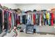 Spacious walk-in closet with ample hanging space and shelving for organized storage of clothing and accessories at 2902 Cullens Dr, Graham, NC 27253