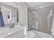 Modern bathroom with glass-enclosed shower and stylish vanity at 2914 Old Stage N Rd, Coats, NC 27521