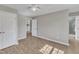 Spacious bedroom with wood-look floors, a double door closet, and ensuite at 2914 Old Stage N Rd, Coats, NC 27521