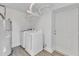Laundry room with washer, dryer, and water heater at 2914 Old Stage N Rd, Coats, NC 27521