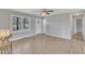 Living room view with light gray walls, new flooring and lots of natural light at 2914 Old Stage N Rd, Coats, NC 27521