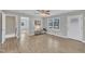 The living room features light gray walls, new flooring and lots of natural light at 2914 Old Stage N Rd, Coats, NC 27521