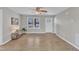 The living room features light gray walls, new flooring and lots of natural light at 2914 Old Stage N Rd, Coats, NC 27521