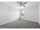 Bright bedroom featuring a ceiling fan, plush carpet and natural light from the window at 3105 Marshlane Way, Raleigh, NC 27610