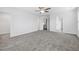 Expansive bedroom with neutral carpet, multiple doors, and ample space at 3105 Marshlane Way, Raleigh, NC 27610
