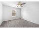 Bedroom with large window and neutral carpet at 3105 Marshlane Way, Raleigh, NC 27610