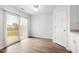 Bright dining area featuring sliding glass doors and stylish flooring, perfect for casual meals at 3105 Marshlane Way, Raleigh, NC 27610