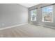 Bedroom with neutral carpeting and two sunlit windows at 3574 Johnson Grant Dr, New Hill, NC 27562
