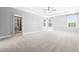 Large main bedroom with ceiling fan, walk-in closet, and plenty of natural light at 3574 Johnson Grant Dr, New Hill, NC 27562