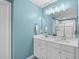 Bathroom featuring a double vanity sink and a glass-enclosed shower at 3727 Horton Hill Dr, New Hill, NC 27562
