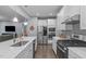 Spacious kitchen with stainless steel appliances, large island, and open floor plan at 3727 Horton Hill Dr, New Hill, NC 27562