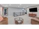 Open living area with stairway featuring comfortable sofa and entertainment center at 3727 Horton Hill Dr, New Hill, NC 27562