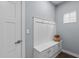 Mudroom features built-in bench with storage, coat hooks, and window for natural light at 3727 Horton Hill Dr, New Hill, NC 27562