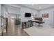 Spacious room featuring wood floors and carpet transition, making it ideal for a home office at 3727 Horton Hill Dr, New Hill, NC 27562
