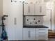 Garage features cabinet and drawer storage with a work bench area, providing utility and organization at 4000 Passenger Pl, Durham, NC 27703