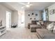 Cozy living room with comfortable seating, carpeted floors, and natural light at 4000 Passenger Pl, Durham, NC 27703