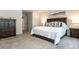 Comfortable main bedroom with carpeted floors, ample natural light, and contemporary decor at 4000 Passenger Pl, Durham, NC 27703