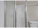 Clean bathroom features a shower with sliding glass door and a white toilet at 417 Baker St, Nashville, NC 27856