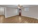 Bright living room with wood-look flooring and lots of natural light at 417 Baker St, Nashville, NC 27856