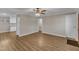 Bright, open-concept living room featuring modern flooring and neutral color scheme at 417 Baker St, Nashville, NC 27856
