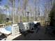 Backyard view featuring a covered patio with an outdoor kitchen and a pool at 4336 N Greg Allen Way, Oxford, NC 27565