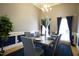 Elegant dining room with stylish decor, seating for six, and sophisticated lighting at 4336 N Greg Allen Way, Oxford, NC 27565