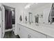 Spacious bathroom featuring double vanity, modern fixtures, and a tub-shower combo at 505 Marion Hills Way, Knightdale, NC 27545