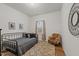 Comfortable bedroom featuring unique decor, carpet, and a full-sized bed at 505 Marion Hills Way, Knightdale, NC 27545