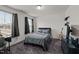 Neutral bedroom offering carpeted floors, a queen-size bed, and natural light at 505 Marion Hills Way, Knightdale, NC 27545