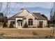 Community clubhouse boasts a charming facade with stone accents and meticulously maintained landscaping at 505 Marion Hills Way, Knightdale, NC 27545