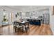 Open-concept kitchen and dining area with an island and modern gray cabinetry at 505 Marion Hills Way, Knightdale, NC 27545