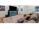 Spacious living room with a large TV and decoratively styled furniture at 505 Marion Hills Way, Knightdale, NC 27545