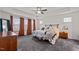 Light filled main bedroom with trey ceilings, large windows, and modern decor at 505 Marion Hills Way, Knightdale, NC 27545