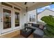 Relaxing screened porch featuring outdoor seating and views, great for enjoying the fresh air at 505 Marion Hills Way, Knightdale, NC 27545