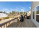Outdoor back deck with railing and backyard view and plenty of privacy in a wooded neighborhood at 518 Parlier Dr # 82, Apex, NC 27523