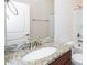 Bathroom featuring granite countertop, brushed nickel faucet, and shower at 518 Parlier Dr # 82, Apex, NC 27523