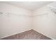 Walk-in closet with brown carpet and wire rack shelving at 518 Parlier Dr # 82, Apex, NC 27523