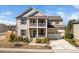 Charming two-story home with a double porch, attached garage, and beautiful landscaping at 518 Parlier Dr # 82, Apex, NC 27523