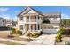 Stunning two-story home with double porch, attached garage, and well-maintained landscaping at 518 Parlier Dr # 82, Apex, NC 27523