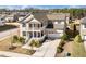 A two-story home with a welcoming double porch and manicured front yard landscaping at 518 Parlier Dr # 82, Apex, NC 27523