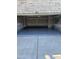 View of the spacious garage with epoxy flooring, offering a clean and durable surface for parking and storage at 518 Parlier Dr # 82, Apex, NC 27523
