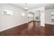 Bright living room with hardwood floors, large windows, and plenty of natural light and fresh paint at 518 Parlier Dr # 82, Apex, NC 27523